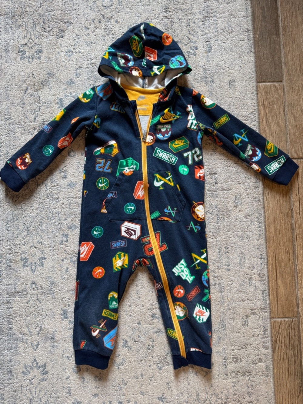 Nike Navy Hooded Kids One-Piece with Colorful Sports Patch Print